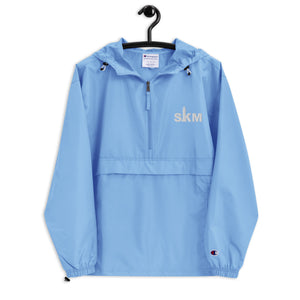 Open image in slideshow, SKM Baby Blue Embroidered Champion Packable Jacket
